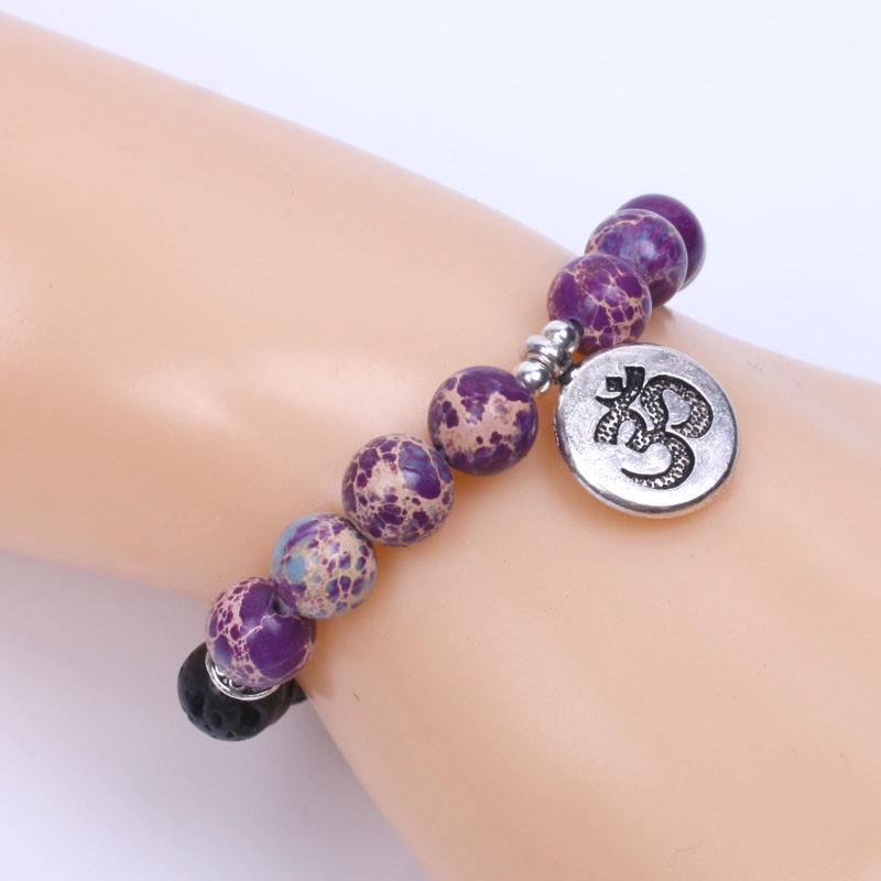 Lava stone Tibetan silver OM charm Energy Bracelet