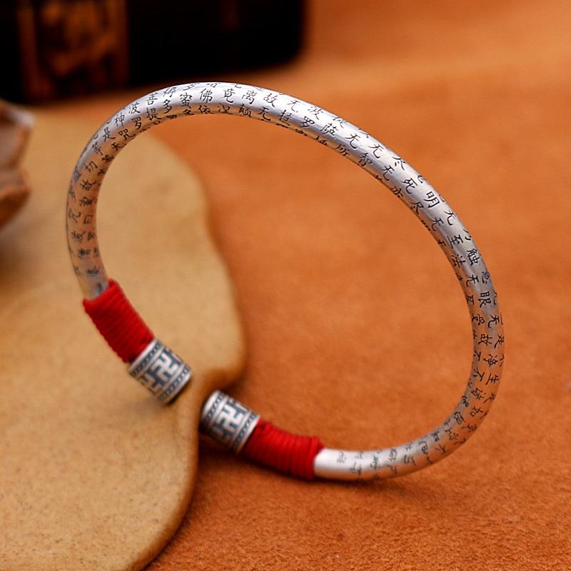 Ethnic Thai Silver Auspicious Symbols & Red Rope Accented Bangle