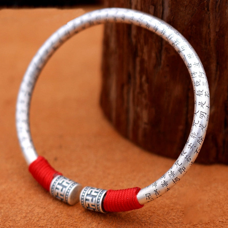 Ethnic Thai Silver Auspicious Symbols & Red Rope Accented Bangle