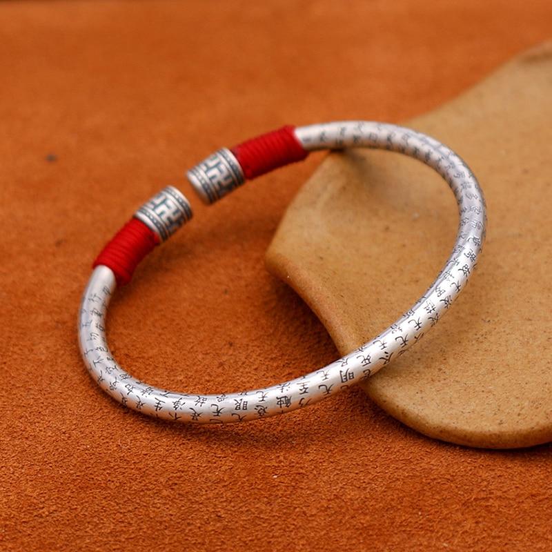 Ethnic Thai Silver Auspicious Symbols & Red Rope Accented Bangle