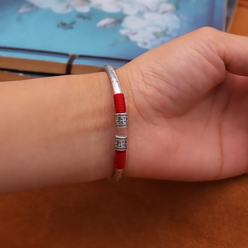 Ethnic Thai Silver Auspicious Symbols & Red Rope Accented Bangle