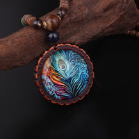 Thumbnail for Ethnic Nepalese Peacock Feather Design & Sandalwood Necklace