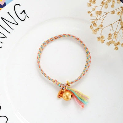 Hand Woven Multicolored 'PICK ME UP' Rope Bell Bracelet